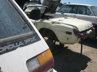 Illustration for article titled Junkyard Jackpot: BMW 2002, Corolla GT-S, Triumph Spitfire